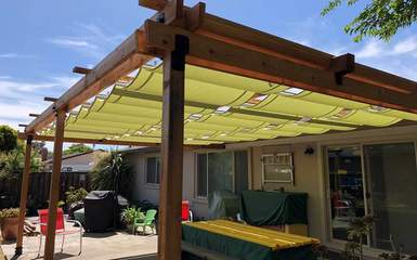retractable residential slide on wire guide wire patio deck pergola canopy