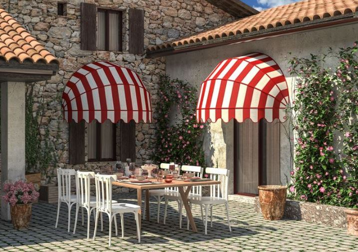 Red striped retractable window canopies
