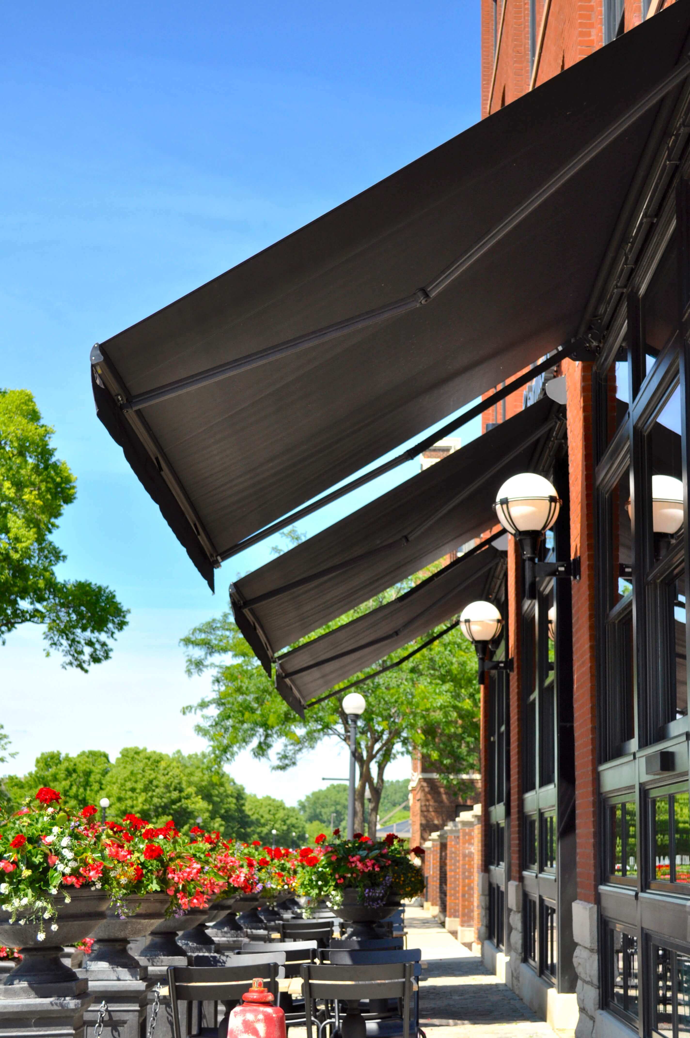 Charmant hotel retractable folding lateral arm awnings