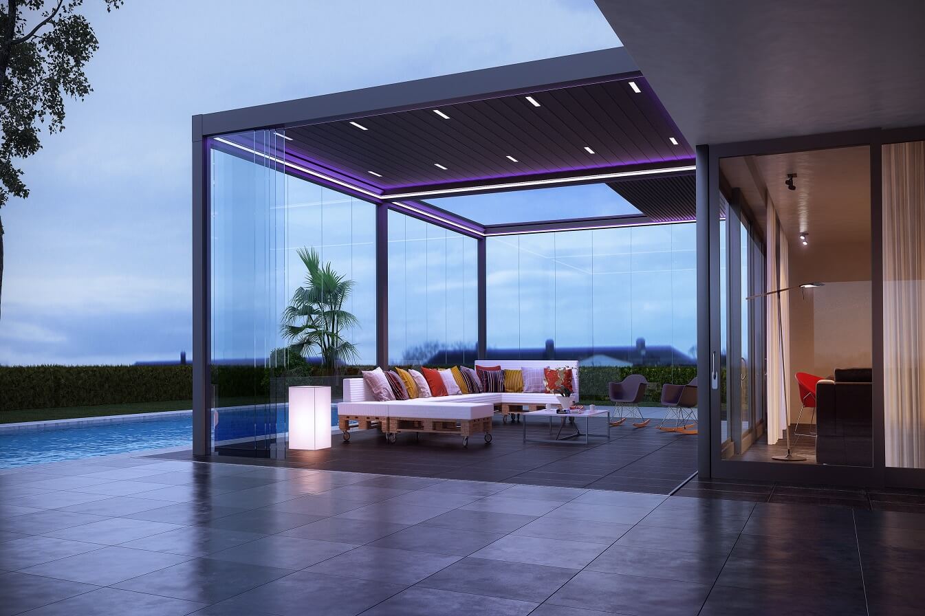 Sunset in an outdoor room protected by a retractable roof