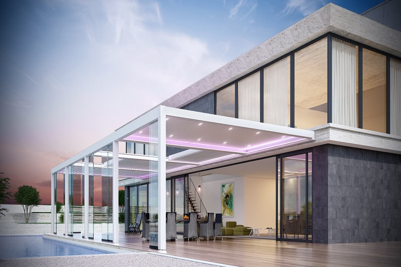 Retractable louver roof pergola system protecting outdoor furniture by a pool