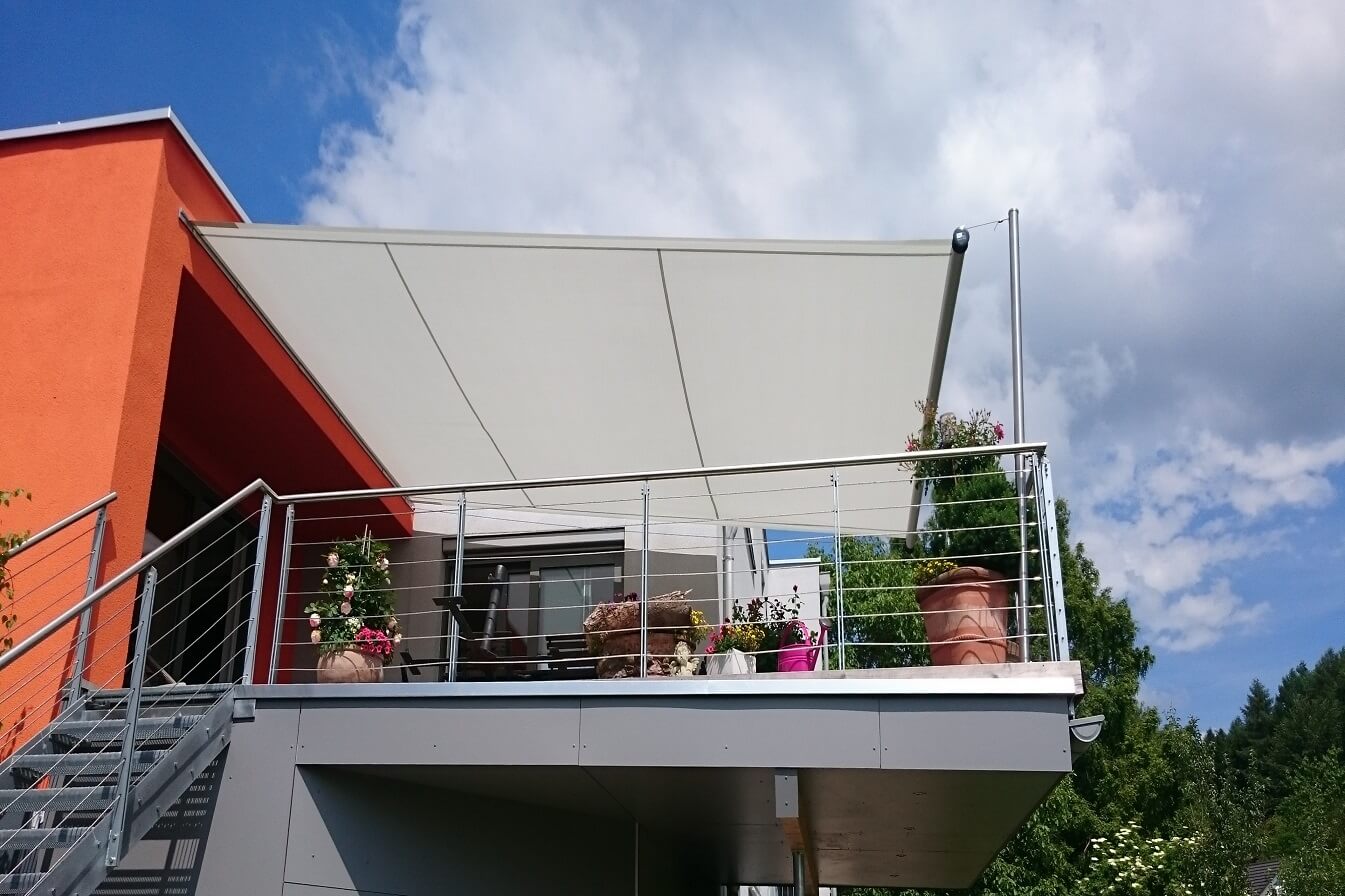 Retractable shade sail for decks with potted plants