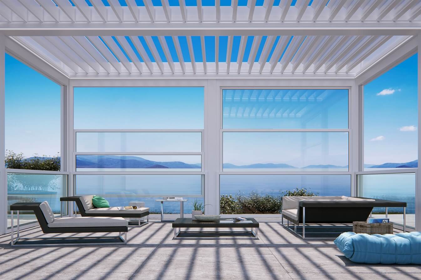 A white pergola with a louvered roof
