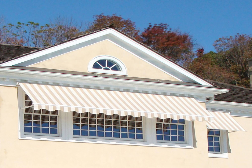 A Trieste retractable side arm awning on a California home