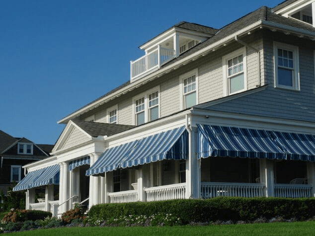 Blue striped awnings on a home