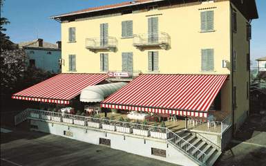 Don't these awnings want to make you have a nice meal at this restaurant?