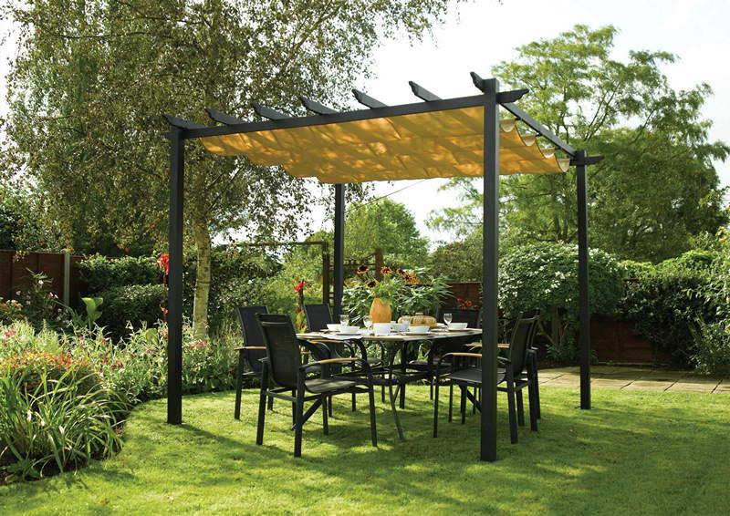 Dark gray framed retractable pergola attached to concrete footers