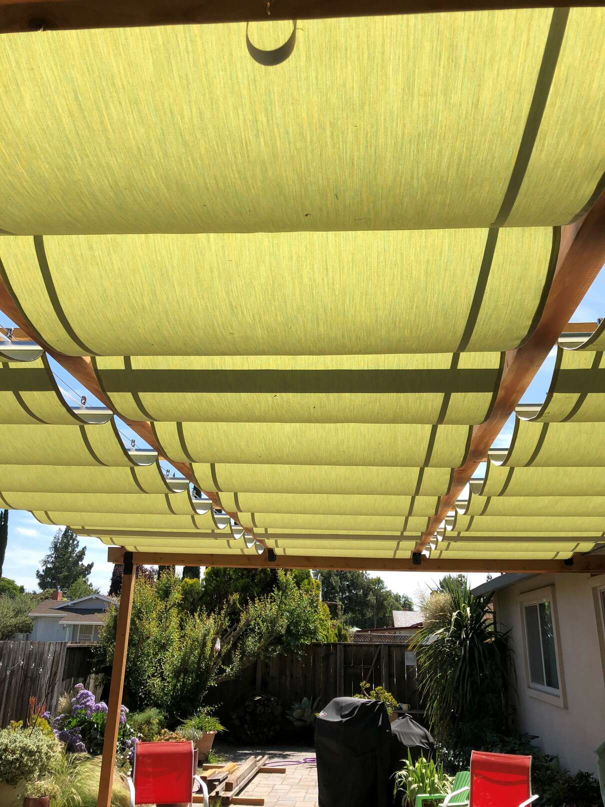 retractable guide wire slide on wire sun canopy