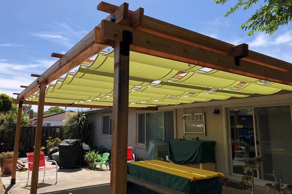 The wooden frame and slide on wire  shade canopy gives out a rustic and homey feel